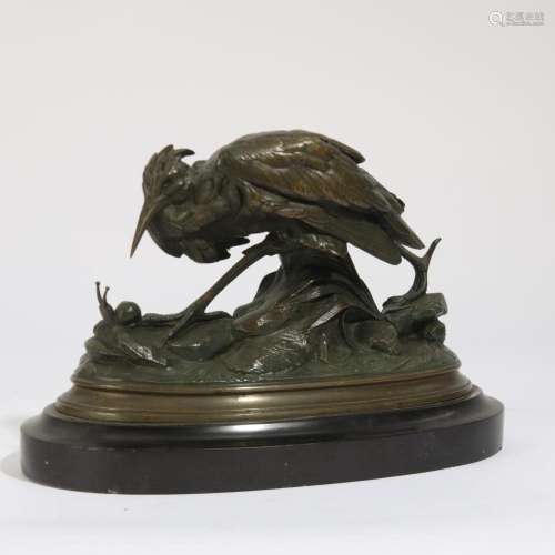 A bronze model of a heron and snail, after a model by Louis-...