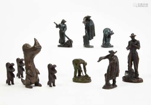 A group of six patinated bronze workers, after Aimé Jules Da...