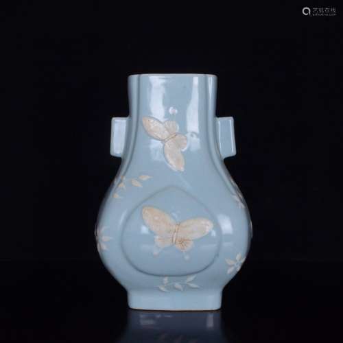 Powder blue glaze carving flower vase with a butterfly tatto...