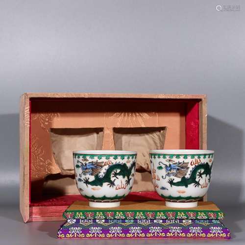 TWO CHINESE FAMILLE-ROSE CUPS DEPICTING 'DRAGON PURSUING...