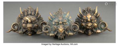 A Group of Three Gilt Bronze Tibetan masks 6 x 7-1/2 x 2 inc...