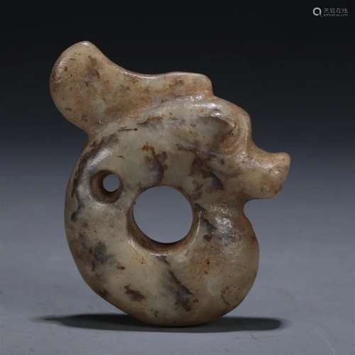 A Hongshan Culture C-Shaped Jade 'Dragon' Pendant.