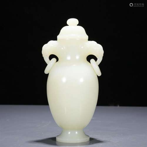 A Precious White Jade Elephant-Handled Vase And Cover