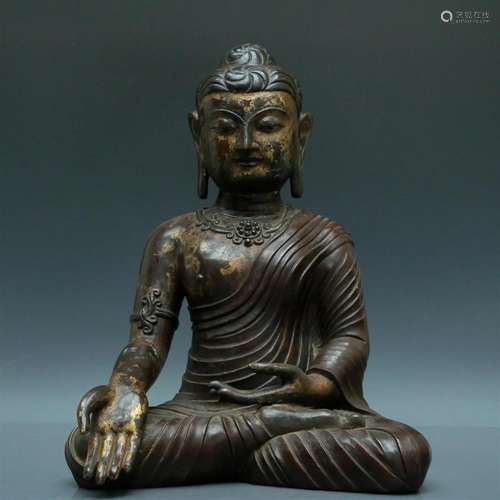 A Gilt-Bronze Figure Of Buddha Shakyamuni