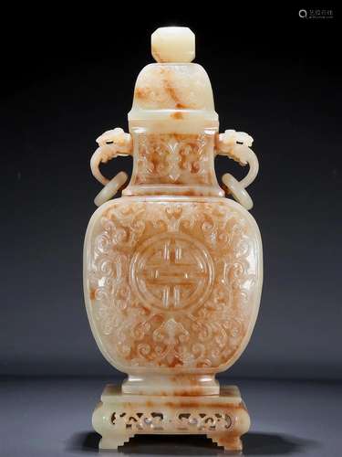 A Wonderful White Jade 'Scrolling Lotus' Ruyi-Handle...