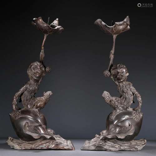 A Fabulous Pair Of Bronze Monkey-Form Candlesticks