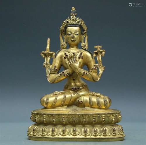 An Archaic Gilt-Bronze Figure Of Manjusri