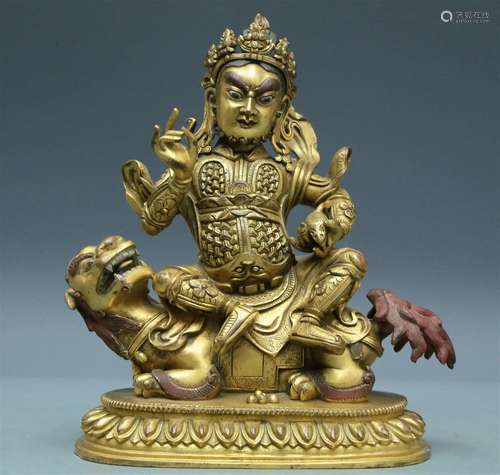 An Archaic Gilt-Bronze Figure Of Kubera