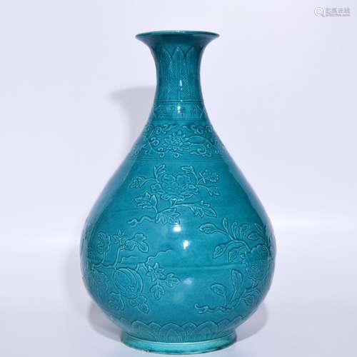 A hoard of glaze relief three fruit grain okho spring bottle...