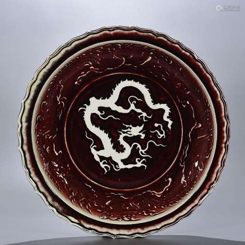 Ruby red glaze carving dragon ling mouth fold along the plat...