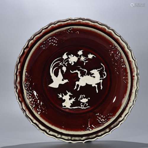 Ruby red glaze carving kylin grain ling fold along the plate...