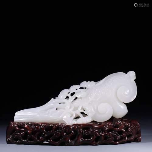 Hetian jade ruyi22.5 cm long, 9 cm wide. 4 cm thick. Weighs ...