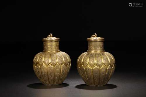 : copper and gold runs carved lotus-shaped grain capping a p...