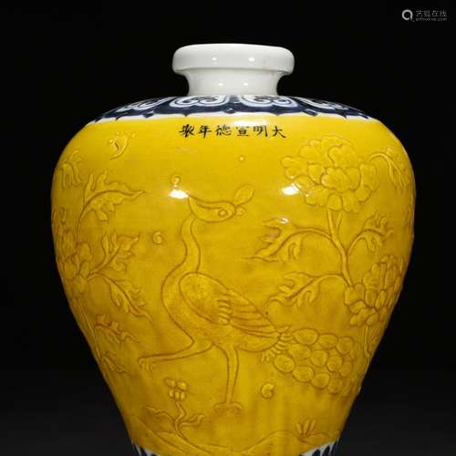 Blue and white jiao yellow glaze carving peacock peony grain...