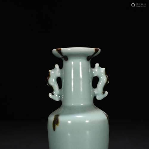 Longquan celadon vase with a zebra fish powder blue glaze po...