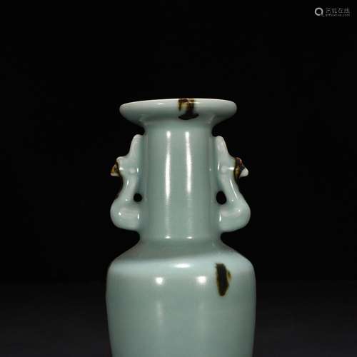 Longquan celadon vase with a powder blue glaze point spot ch...