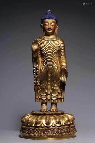 Gold, copper Buddha stands resemble