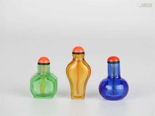 A set of colored glass snuff bottles