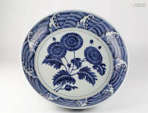 Chinese blue and white glazed porcelain plate with flower pa...