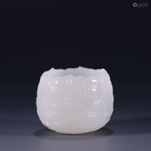 Hetian jade lotus cupHigh 4.3 cm, 5.2 cm wide. Weighs 70.6 g...