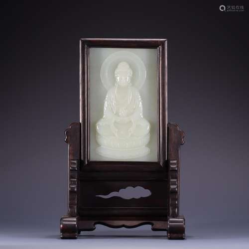 Hetian jade Buddha plaqueHigh 24.7 cm, 15.3 cm wide. Jade sc...