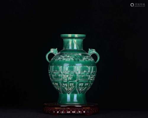 Kiln malachite green glaze sculpture in grain and bottles of...
