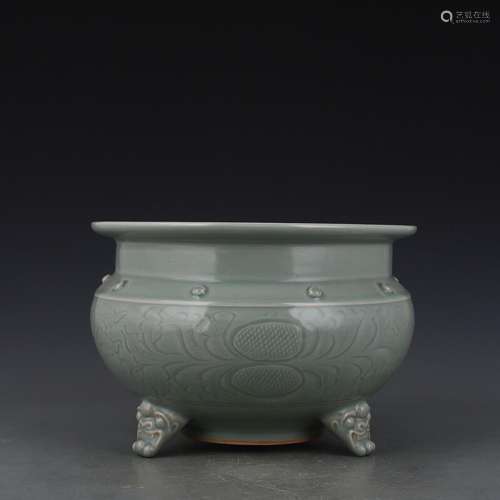 The secret color yue kiln celadon depicting three feet furna...