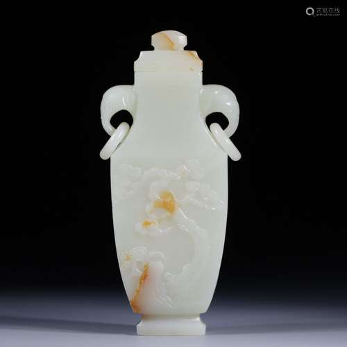 Hetian jade elephant earsHigh 14.6 cm, 6.5 cm wide. 2.6 cm t...