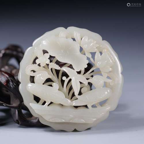 Hetian jade yang MosaicDiameter of 5.4 cm. 1 cm thick. Weigh...