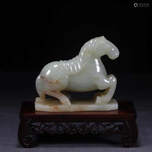 And hetian jade horse high 8.8 cm wide and 9.8 centimeters t...