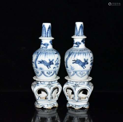 Generation of blue and white animal print revolving bottles ...