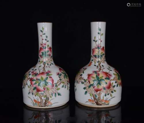 A bell and a pair of pastel pomegranate lines;22.5 x13;84700...