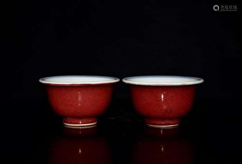 The pressure hand a cup of a pair of red glaze porcelain of ...