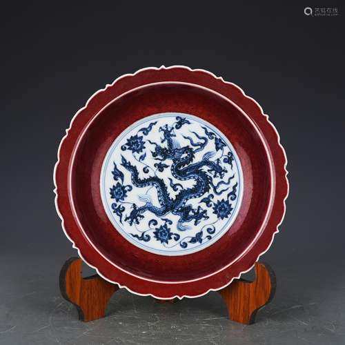 Given the royal zheng ji red glaze blue and white dragon med...