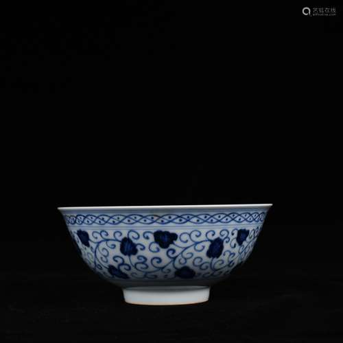 Blue and white flowers green-splashed bowls bound branches s...