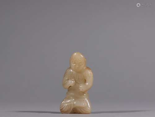 Hetian jade the lad carvings.Specification: high 5.7 cm wide...