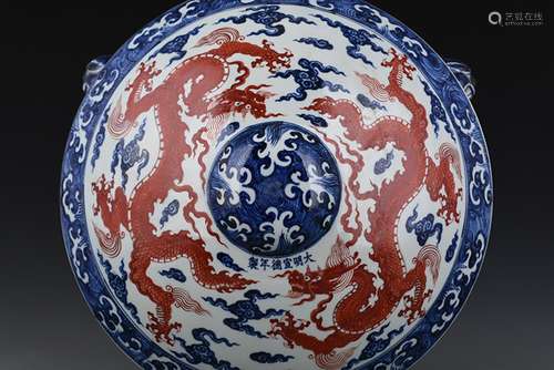 Blue and white alum red sea water dragon grain wall pot of c...