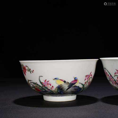 Colored enamel green-splashed bowls fruits and flowers and b...