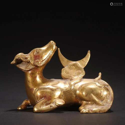 A Rare Gilt-bronze Beast Ornament