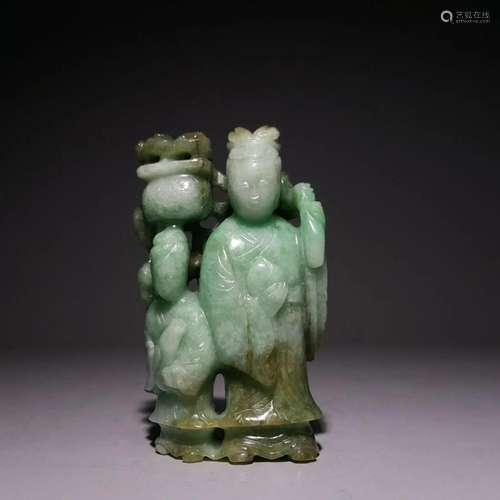 A Rare and Fine Carved Jadeite Figure of Guanyin