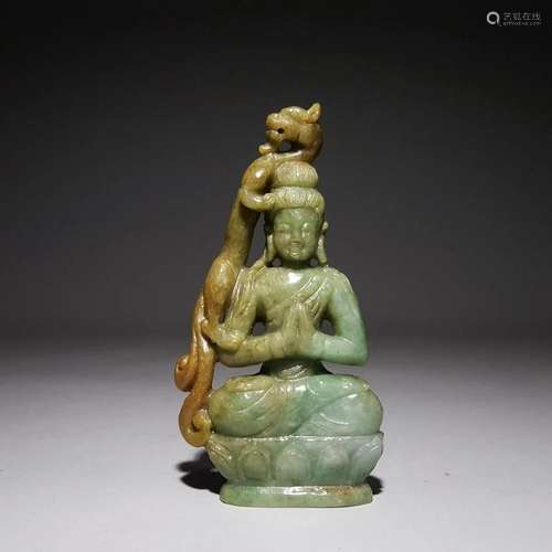 A Fine Carved Jadeite Figure of Buddha