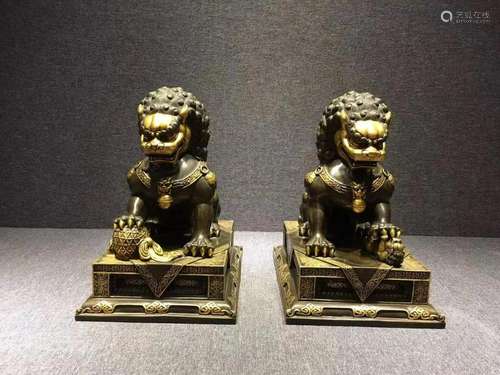 A Pair of Fine Gilt-bronze Lion Ornaments