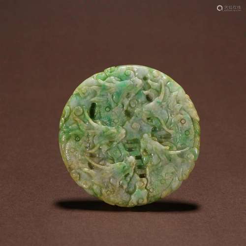 A Fine Carved Jadeite Pendant