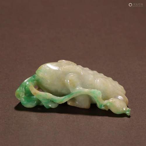 A Rare and Fine Carved Jadeite Cicada Ornament