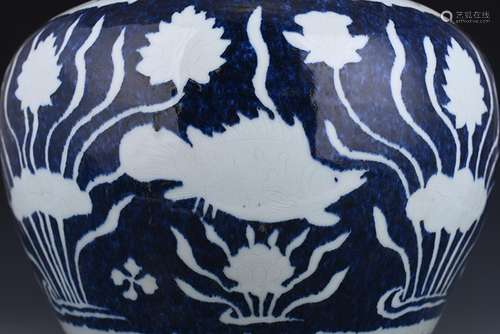 With blue glaze carved white fish and algae grain tank antiq...