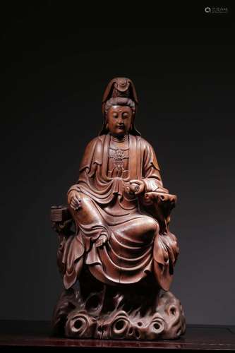 Longan wood carving through the guanyin caveSize: 48 cm tall...