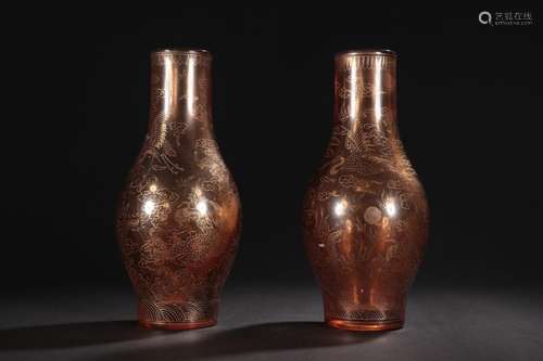 - dark brown coloured glaze colour bottles of a pair of drag...