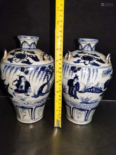 , hand-painted bottles of a pair of blue and white character...