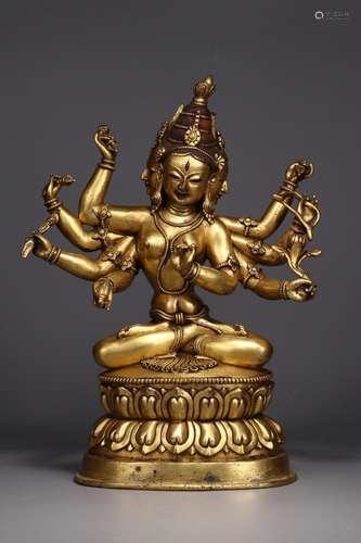 : copper and gold statue of mother Buddha caveLong and 13.9 ...