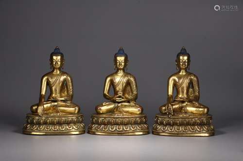 : copper and gold iii Buddha statue14.5 cm long, 11.5 cm wid...